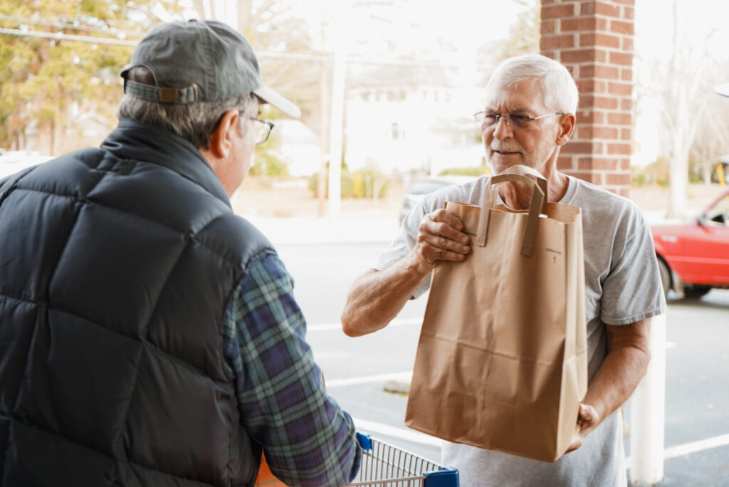 Volunteers distribute food for families in Mebane, NC