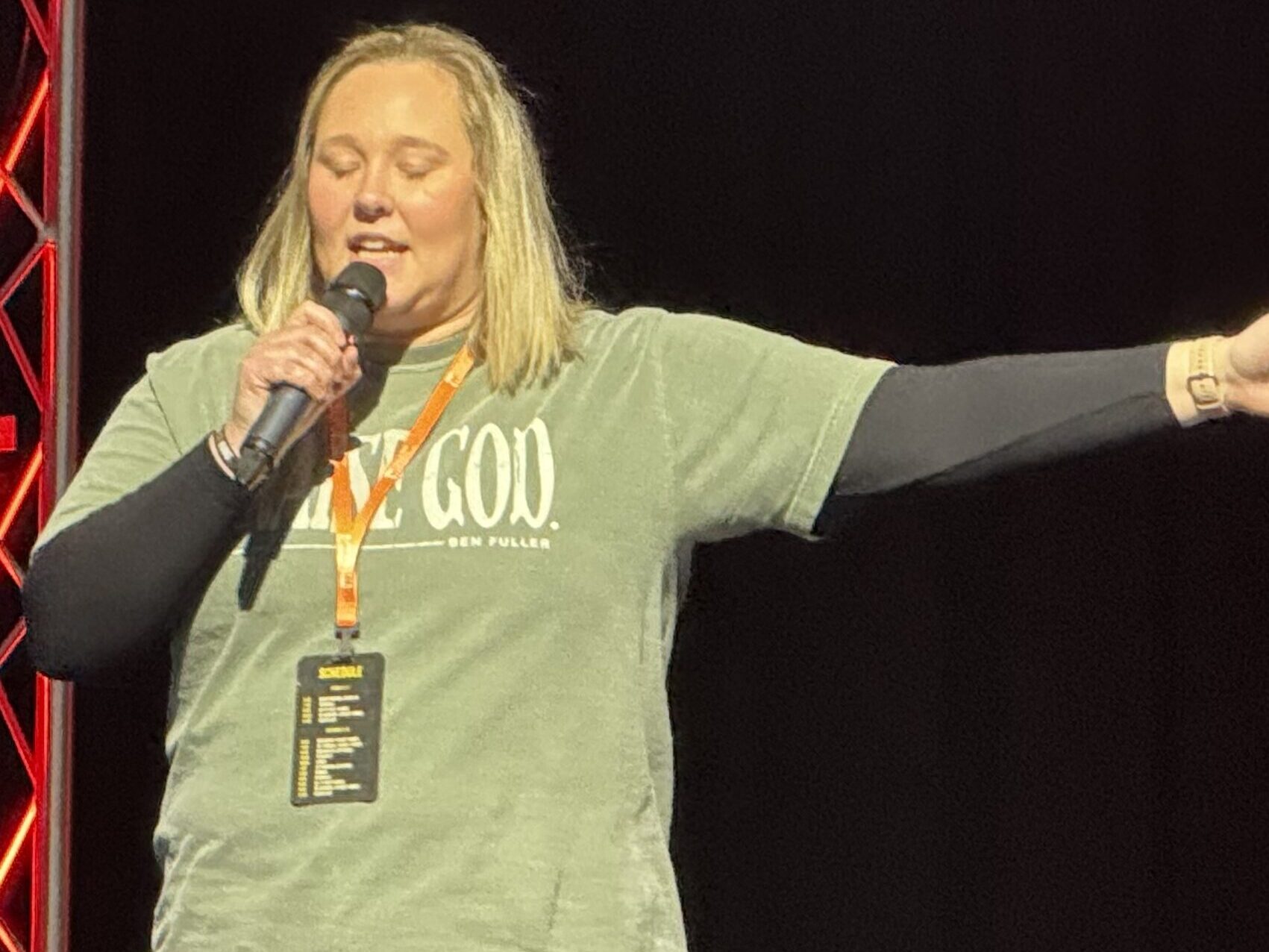 Youth Pastor Maddi Smith praying