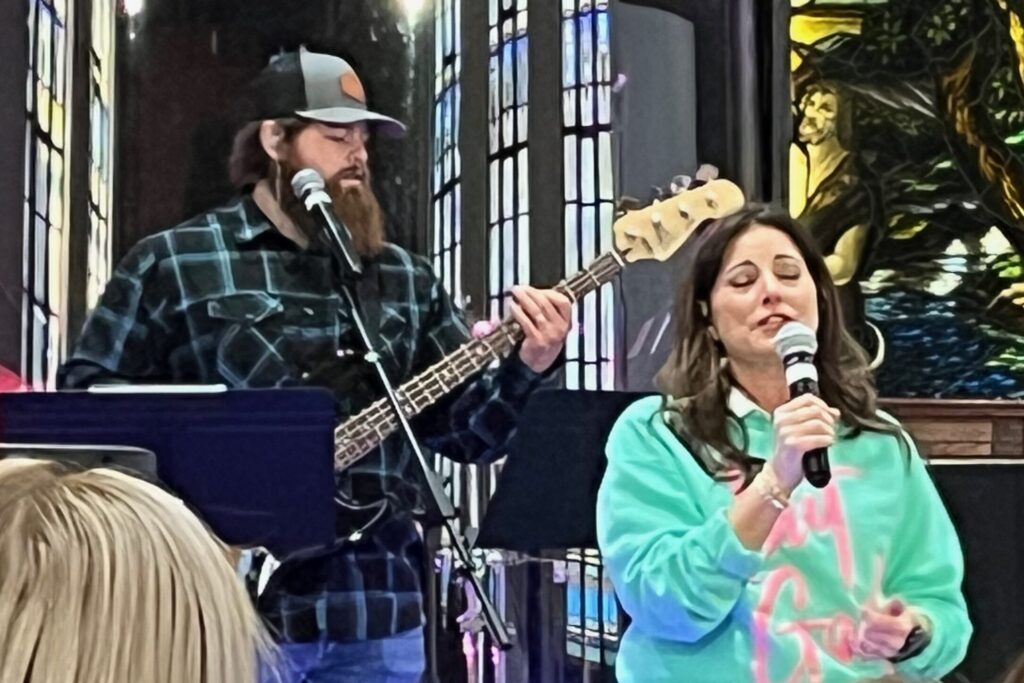 Leading church worship at contemporary service