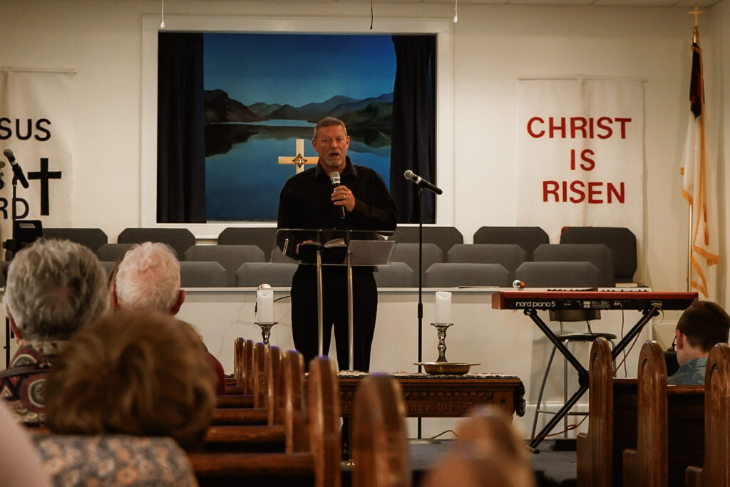 Pastor Sammy preaching at New Life Church