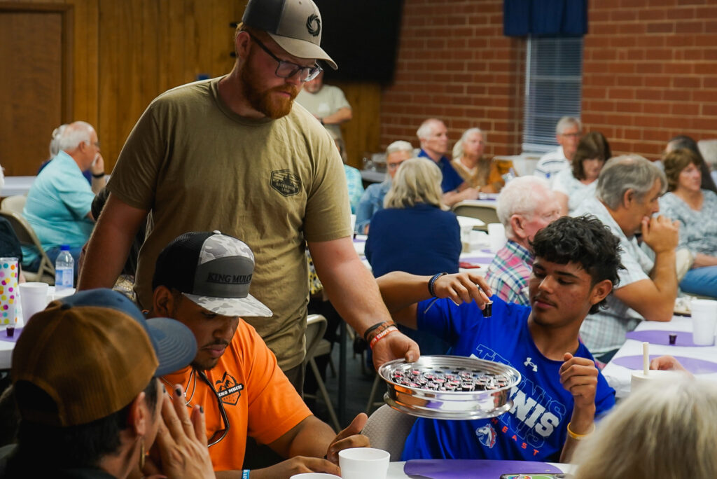 FBCM Blog - Hurley serving communion in his role as deacon